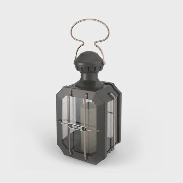 Black Barebones lantern with a hook on a white background