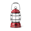 Red lantern with black handle on a white background