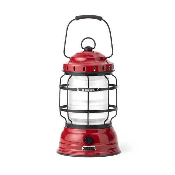 Red lantern with black handle on a white background