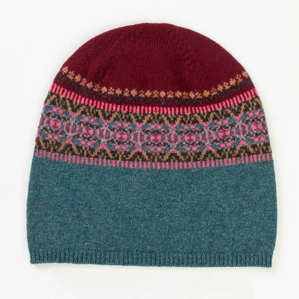 Knitted Eribe beanie with a patterned band on a white background