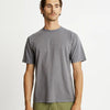 Man wearing a grey heavy weight Mr Simple  t-shirt and green pants 