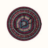 Multicolored circular woven woollen beret  on a white background